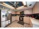 Bright kitchen featuring stainless steel appliances at 309 Belle Isle Ave, Belleair Beach, FL 33786