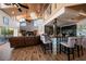 Spacious living room with high ceilings, fireplace, and water views at 309 Belle Isle Ave, Belleair Beach, FL 33786
