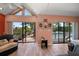 Main bedroom with sliding doors leading to the patio at 309 Belle Isle Ave, Belleair Beach, FL 33786