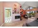 Main bedroom with fireplace and access to bathroom at 309 Belle Isle Ave, Belleair Beach, FL 33786