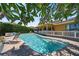 Stunning pool and patio overlooking the canal at 309 Belle Isle Ave, Belleair Beach, FL 33786