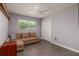 Cozy bedroom with comfortable sofa, natural light, and ample closet space at 3931 38Th S Way, St Petersburg, FL 33711