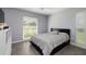 Bright bedroom with ample natural light, comfortable bed, and stylish decor at 3931 38Th S Way, St Petersburg, FL 33711
