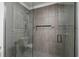 Large walk-in shower with modern grey tile at 3931 38Th S Way, St Petersburg, FL 33711