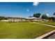 Gray brick home with walkway and manicured landscaping at 3931 38Th S Way, St Petersburg, FL 33711