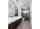 Elegant bathroom with a modern double vanity and shower at 3931 38Th S Way, St Petersburg, FL 33711
