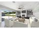 Living room with fireplace, built-in shelves, and comfortable seating at 3931 38Th S Way, St Petersburg, FL 33711