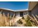 Modern front entry with black door and landscaping at 3931 38Th S Way, St Petersburg, FL 33711