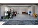 Spacious garage with epoxy flooring and ample storage at 3931 38Th S Way, St Petersburg, FL 33711
