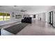 Open concept living area with a view into the kitchen at 3931 38Th S Way, St Petersburg, FL 33711