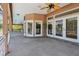 Covered patio with a built-in bar and pool access at 6109 Waters Way, Weeki Wachee, FL 34607