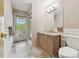 Bathroom with granite countertop and walk-in shower at 6109 Waters Way, Weeki Wachee, FL 34607