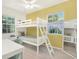 Bedroom with bunk beds, light walls, and ample natural light at 6490 34Th N Ave, St Petersburg, FL 33710