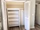 Closet with built-in shelving unit for organized storage at 10366 136Th St, Largo, FL 33774