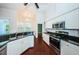 Bright and functional kitchen with stainless steel appliances, granite countertops, and ample cabinet space for storage at 1032 Rosetree Ln, Tarpon Springs, FL 34689