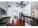 Modern kitchen with stainless steel appliances and granite counters at 1032 Rosetree Ln, Tarpon Springs, FL 34689