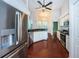 Updated kitchen with stainless steel appliances and granite countertops at 1032 Rosetree Ln, Tarpon Springs, FL 34689