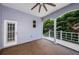 Spacious covered patio with access to deck and backyard at 1032 Rosetree Ln, Tarpon Springs, FL 34689