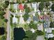 Houses with pools and a lake visible overhead at 1638 Polo Club Dr, Tarpon Springs, FL 34689