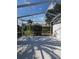 Spacious screened patio, perfect for outdoor enjoyment at 1638 Polo Club Dr, Tarpon Springs, FL 34689