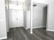 Modern entryway featuring double doors and gray walls at 1638 Polo Club Dr, Tarpon Springs, FL 34689