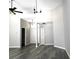 Spacious living room with high ceilings and wood floors at 1638 Polo Club Dr, Tarpon Springs, FL 34689
