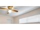 Bedroom with ceiling fan and window blinds at 910 Spindle Palm Way, Apollo Beach, FL 33572