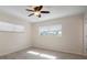 Bright bedroom featuring light flooring and window blinds at 910 Spindle Palm Way, Apollo Beach, FL 33572