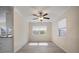 Dining area with ceiling fan and wood-look flooring at 910 Spindle Palm Way, Apollo Beach, FL 33572