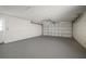 Attached garage with epoxy floor and ample storage at 910 Spindle Palm Way, Apollo Beach, FL 33572