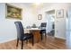 Round dining table with four black chairs in the dining room at 2850 59Th S St # 204, Gulfport, FL 33707