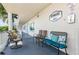 Community patio with seating and lush greenery at 2850 59Th S St # 204, Gulfport, FL 33707