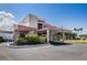 Community clubhouse with covered entrance and landscaping at 2850 59Th S St # 204, Gulfport, FL 33707