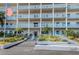 Building exterior showcasing the main entrance and landscaping at 2850 59Th S St # 204, Gulfport, FL 33707