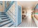 Building hallway with tiled floors and blue accents at 2850 59Th S St # 204, Gulfport, FL 33707