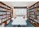 Community library with bookshelves and a reading table at 2850 59Th S St # 204, Gulfport, FL 33707