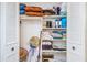 Shelved closet with linens and other storage items at 2850 59Th S St # 204, Gulfport, FL 33707