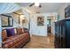 Bedroom with day bed, ceiling fan and en-suite bathroom at 2850 59Th S St # 204, Gulfport, FL 33707