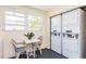 Community laundry room with stackable units and seating at 2850 59Th S St # 204, Gulfport, FL 33707