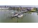 Community boat docks with several boats moored at 2850 59Th S St # 204, Gulfport, FL 33707