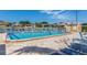 Refreshing community pool with lounge chairs at 2850 59Th S St # 204, Gulfport, FL 33707
