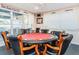 Community game room with large poker table and seating at 2850 59Th S St # 204, Gulfport, FL 33707