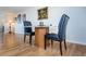 Small dining area with round table and four black chairs at 2850 59Th S St # 204, Gulfport, FL 33707