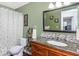 Bathroom with granite vanity, shower, and updated fixtures at 2850 59Th S St # 204, Gulfport, FL 33707