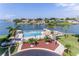 Community pool and surrounding landscape overview at 2850 59Th S St # 204, Gulfport, FL 33707