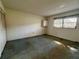 Simple bedroom with carpet and window at 1280 Mission Cir # 45C, Clearwater, FL 33759