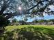 Aerial view of a row of houses with lush green lawn at 1280 Mission Cir # 45C, Clearwater, FL 33759