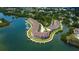 Beautiful aerial view of waterfront community with boat docks and lush landscaping on a sunny day at 129 Brent Cir, Oldsmar, FL 34677