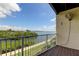This gorgeous balcony view includes a canal, lush mangroves, and ocean views at 129 Brent Cir, Oldsmar, FL 34677