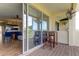 Beautiful indoor outdoor setup with direct access from kitchen to balcony seating area at 129 Brent Cir, Oldsmar, FL 34677